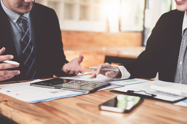 business people working together on a new project to analyze budgets and manage investment risks in today's profit boosting for marketing in the office room